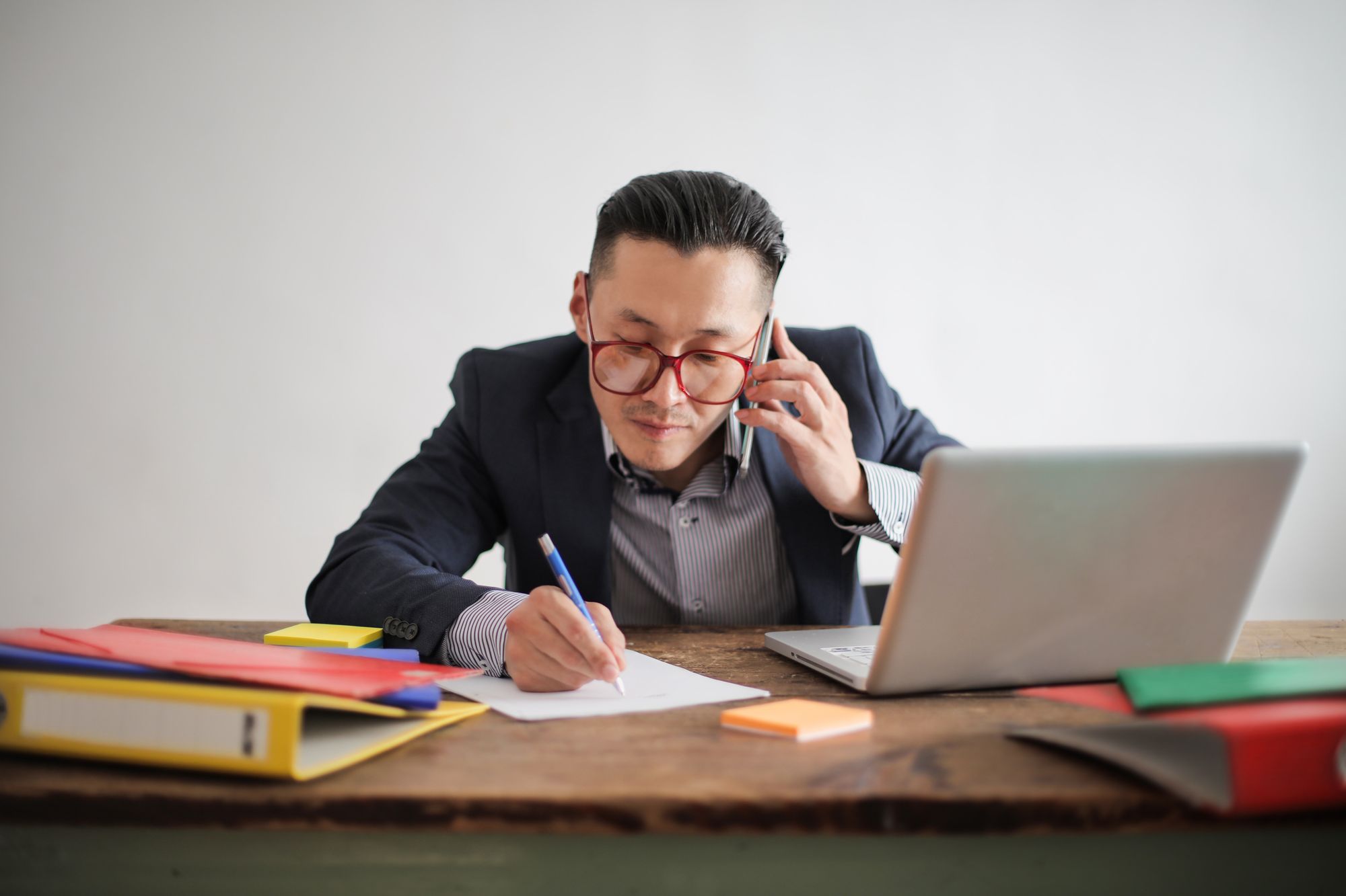 Person planning outreach work at a desk