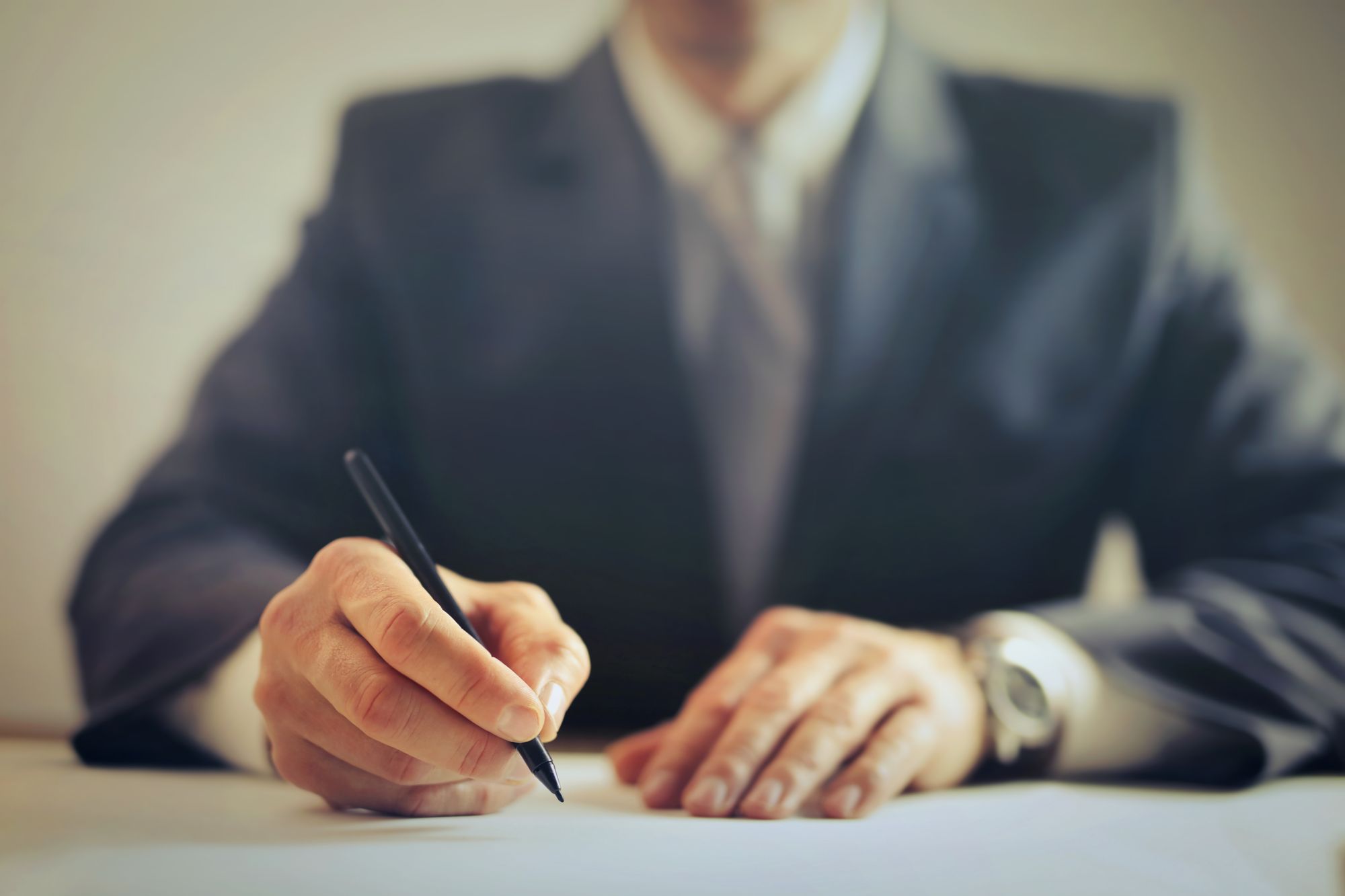 Person reviewing compliance paperwork